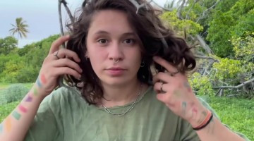 Musician Rolls With It When Hair Gets Tangled In Tree Branch