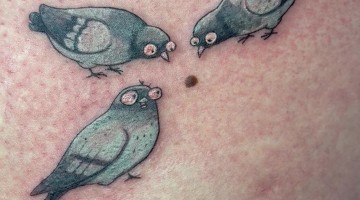 Tattoo of Silly Pigeons Pecking at a Mole