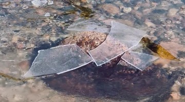 Satisfying Icy Water Breaking on a Rock