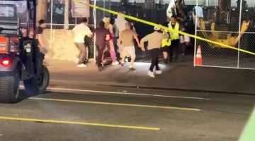 Ravers Rush Past Security at Beyond Wonderland SoCal 2026