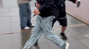 Man Drops Beer Trying to  Catch His Friend