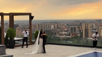 Couple Falls Over When Groom Gets Tangled In Bride's Long Veil