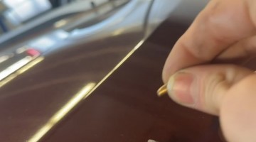 Mechanic Finds Bullet on Car Body