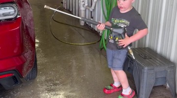 Little Boy Pushed Over By Pressure Washer Kickback