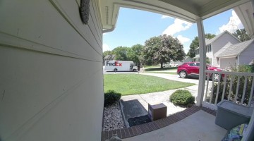 Packages Carelessly Thrown on Front Porch