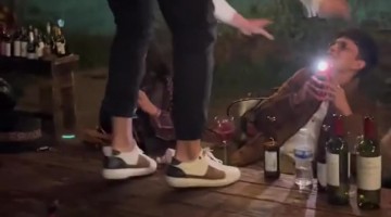 Man Stumbles Off Dinner Table at Party
