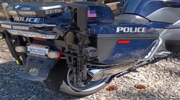 Wreckless Bike Cop Leaves Rifle Out