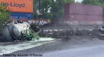 Train Collides With Septic Truck