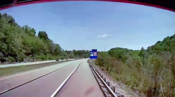 Car Swerves Into Left Lane and Causes a Rollover