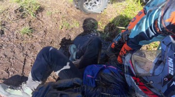 ATV Traps Riders After Flipping