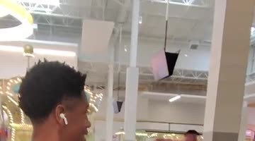 Dancing Buff Guy at Mall Food Court