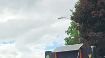 Improperly Secured Construction Sign Rolls Into Traffic