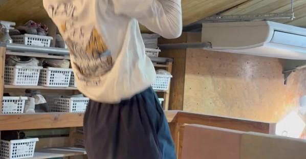 Young Climber Performs a Finger Pull-Up