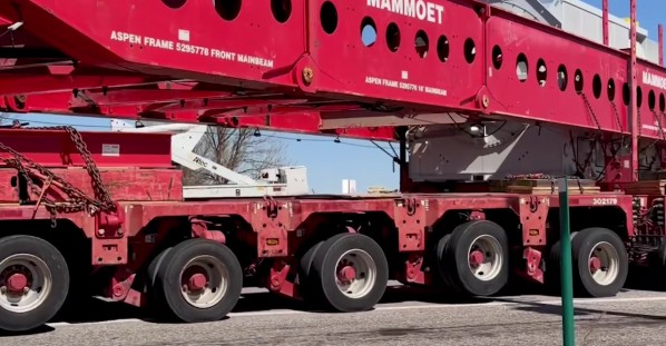 Massive Generator Convoy Navigates Tight Streets