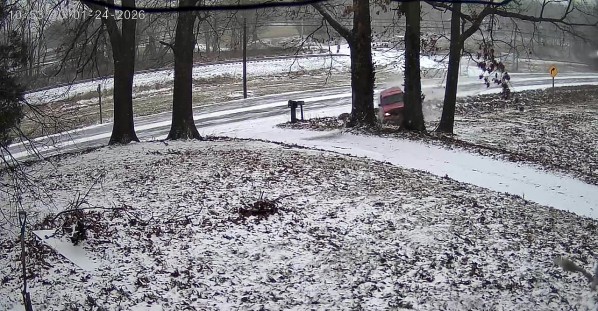 Speeding Truck Loses Control in Snowy Conditions