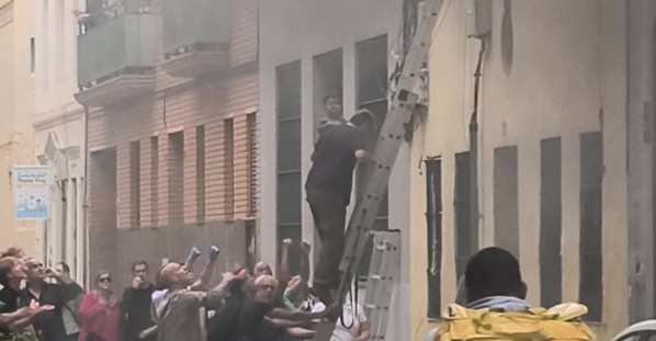 People Escape Burning Building