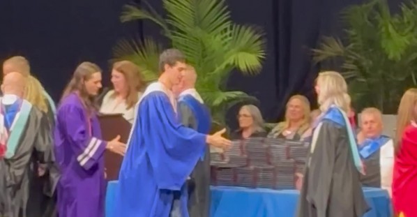 Paid Brother Falls At Graduation