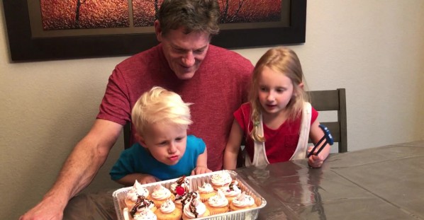 Kid Blows Out Dad's Candle