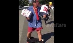 Man touts beer kegs, wears pants around ankles to poke fun at Kavanaugh during DC protests