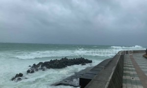 Waves crash on Okinawa beach as typhoon brings strong winds and rains to Japan's south