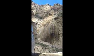 Indian workers shaken up after landslide gets too close for comfort