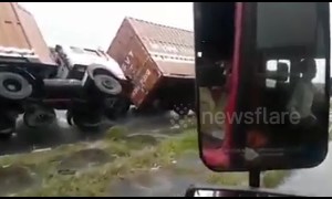 Cyclone Titli overturns several heavy trucks on Indian highway