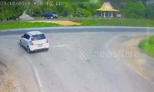 Woman's car flattened by out-of-control truck while waiting at junction
