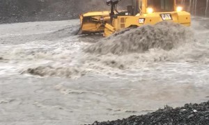 Mass Rainfall Poses Major Threat to Bridge