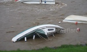 After Storm Callum: Capsized boats in Welsh harbour
