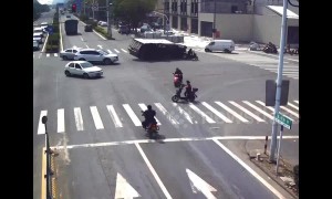 Motorcyclist narrowly misses death by inches as truck makes sharp swerve