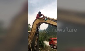 Man tries to fix broken digger with tape