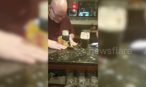 Pub-goer performs incredible trick with pint of Guinness and packet of crisps