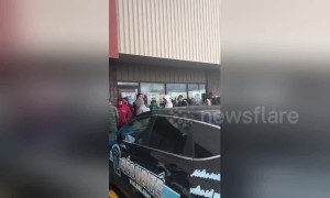 Hundreds line up outside dispensary in Quebec as Canada legalises recreational marijuana