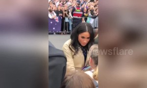 Meghan Markle greets crowds of fans in Melbourne