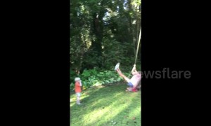 Swinging mom accidentally knocks over toddler when she gets too close