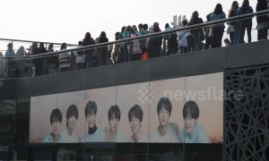 K-pop fans camp overnight in chilly temperatures for BTS show in Paris