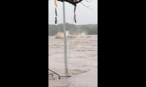 Footage shows broken parts of bridge floating in flooded Texas river