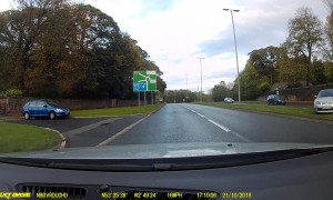 Car Nearly Spins Out into Oncoming Traffic