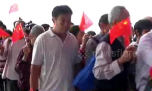 China’s new mega-bridge welcome thousands of excited commuters on first day of service