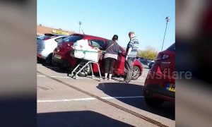 Couple hilariously attempt to unlock the wrong car as their own identical vehicle sits two spaces away