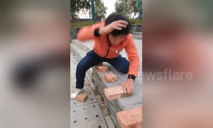 Kung fu master smashes his way through 50 bricks in 40 seconds