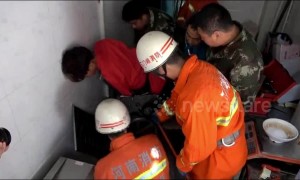 Chinese firefighters free man with arm trapped in noodle-making machine
