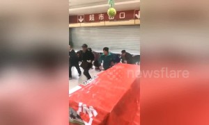 Chinese seniors race through supermarket to grab groceries