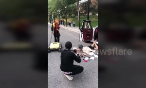 Chinese street cleaner photobombs social media challenge