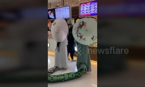 Half-snake, half-human Halloween costume scares shoppers at Beijing mall