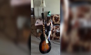 He Can't Lift the Guitar, but that Won't Stop him from Playing