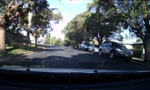 Trick or Treaters Cross Road in Front of Car
