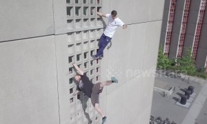 Daredevil climbers easily scale 10-floor apartment block in Denmark