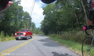 Shocking moment driver hurls full water bottle at female cyclist