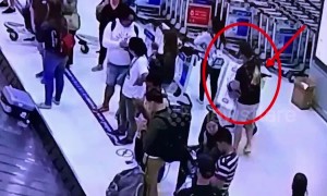 Couple steal US tourist's designer suitcases from Bangkok airport baggage carousel